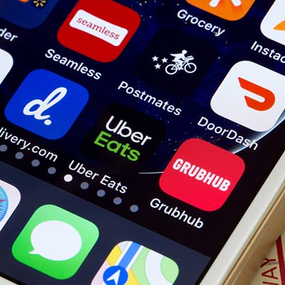 smart phone with gig apps such as Uber and Door Dash
